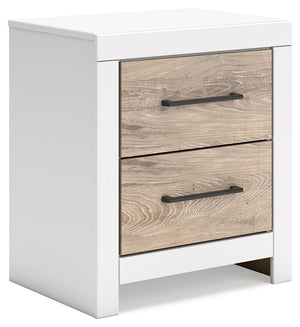 Relaxed yet striking, this nightstand brings casual beauty and function to your dream destination. A delightful two-tone treatment blends a fresh replicated oak grain with a matte white finish, while sleek handles in an antiqued gunmetal finish lend a con