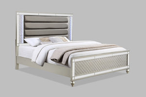Cristian-Uph Queen Bed-Champagne<h4><b>Cristian - Queen Footboard - Champagne</b></h4> <table width="100%"><colgroup><col style="width: 30%"> <col style="width: 70%"> </colgroup> <tbody> <tr> <td>Dimensions</td> <td> 63.00"L x 86.50"D x 61.75"H</td> </tr>