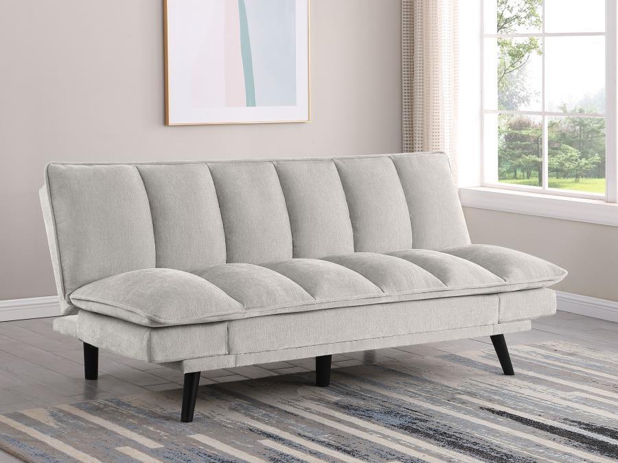 Versatility reigns in a modern sofa bed. Soft upholstery complements perfectly, bringing inviting style to a convertible design. It goes from sofa to bed with a lay-flat mechanism, perfect for a multi-functional space like a home office or compact living 