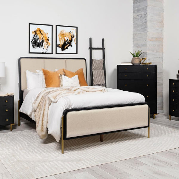  designed with retro-inspired elements and luxurious details. Cream fabric upholstery on the headboard and footboard is framed by a sleek black edge