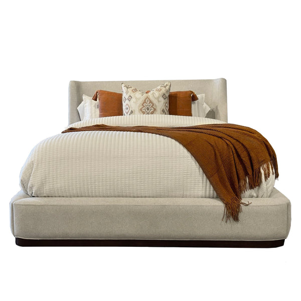  and the medium wood-tone trim adds a modern touch. The clean lines and large headboard suit various styles. Available in Queen or King si