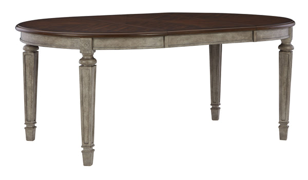 This oval dining room table adds understated beauty to any dining space with its traditional cottage design. Its outstanding two-tone finish features an antiqued gray body with a rich deep walnut brown top. This ample round table includes one extension le