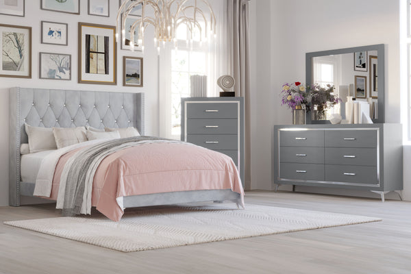 The Huxley 4-Piece Bedroom Set in Gray offers a perfect blend of contemporary glam and durable craftsmanship for a stylish and functional bedroom. This set includes an upholstered bed with headboard, footboard, two side rails, and slat kit, along with a 6