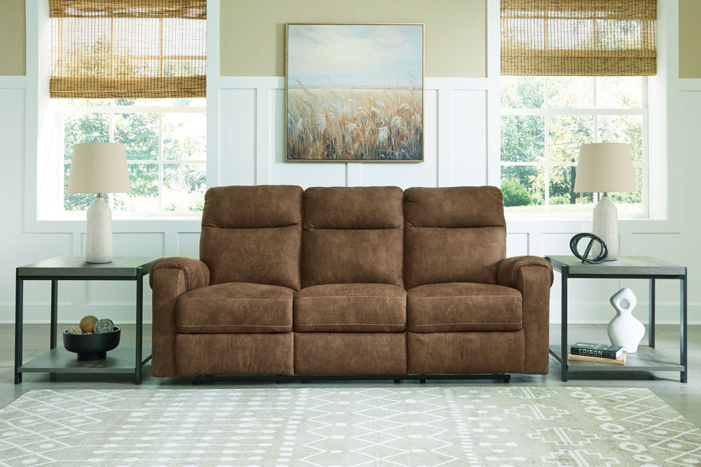 This reclining sofa and matching loveseat is your best shot for comfort and total relaxation. Its super soft faux leather, contemporary bustle back and contrast stitching team up for a big win with most any color scheme and room decor. With the pull tab r