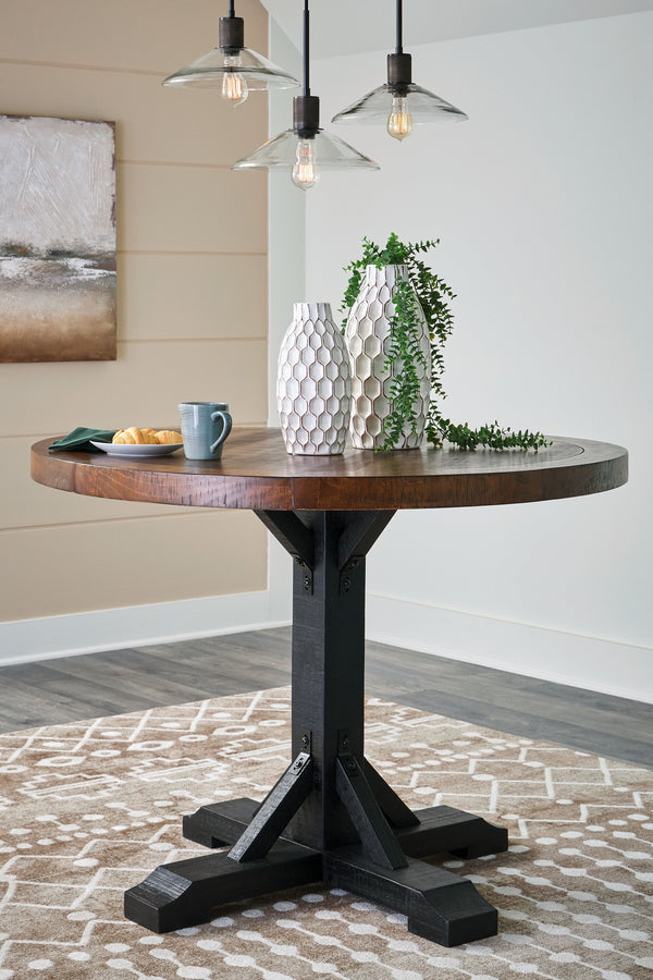  its two-tone finish is versatile enough for many casual aesthetics. Round counter height table features a sturdy post and bracket base design in a rustic black finish with a thick 48-" rou