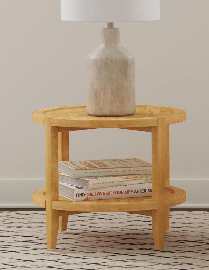 Encourage a warm, welcoming ambiance with the choice of a modern farmhouse end table. Its round profile is crisp and familiar, while offering movement and flowing energy. The table is crafted in Asian hardwood for optimal quality and received a warm maple
