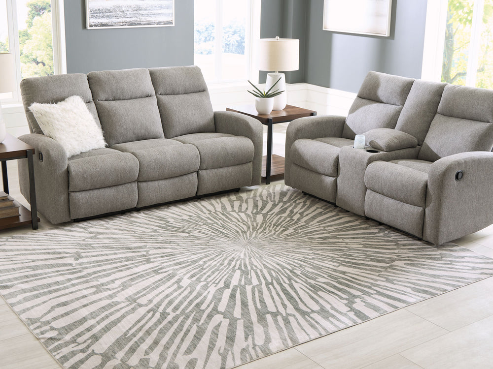 This rug takes traditional design motifs and brings them into the present. Outfitted with deliciously soft faux fur and a chic sunburst design in shades of gray and white, it-'s an apt addition to contemporary interiors. Further suiting your modern lifest