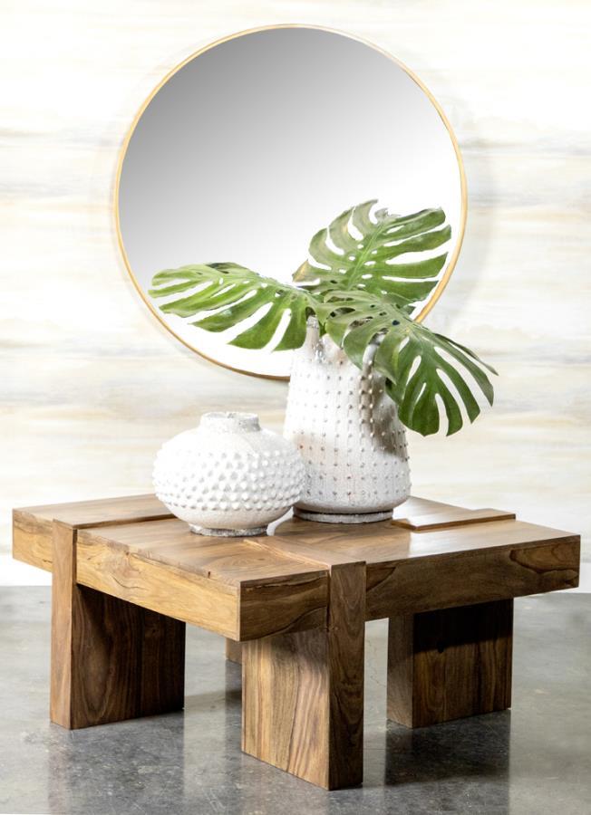 This square coffee table blends modern simplicity with timeless craftsmanship. Constructed from solid sheesham wood, it showcases a natural finish that highlights the unique grain patterns of the wood. Its robust design features clean lines and geometric 