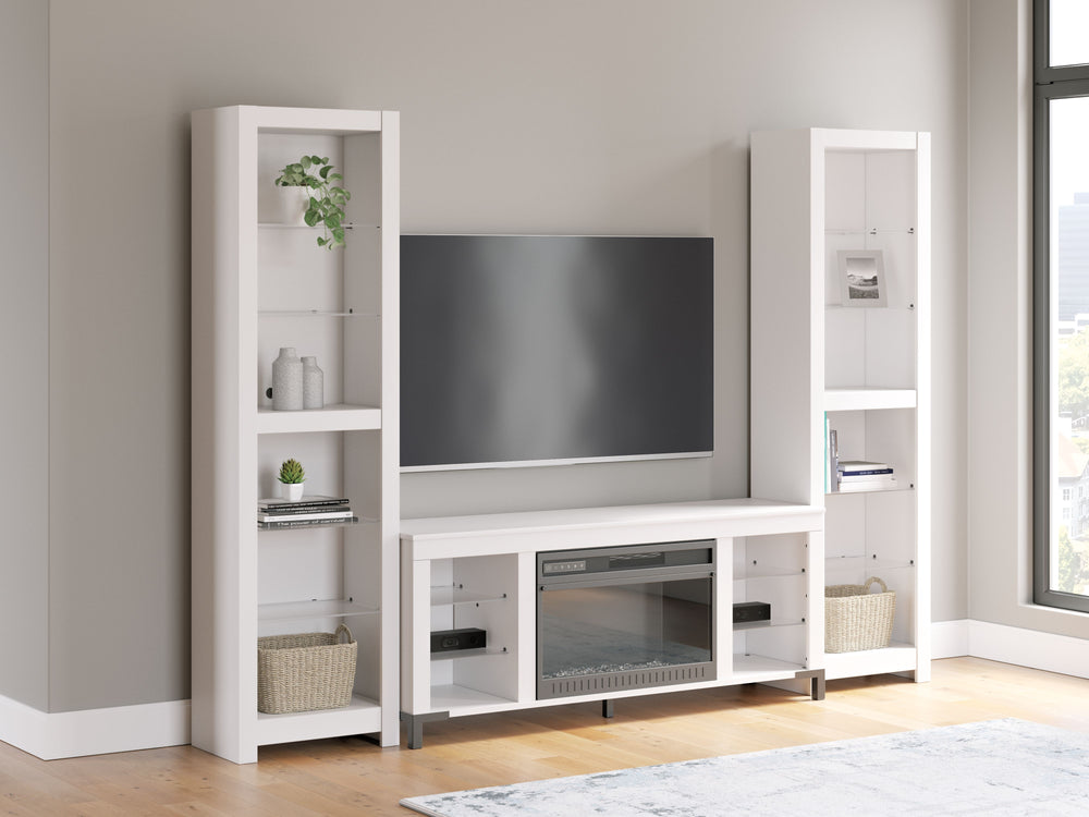 Level up your gaming experience and make movie nights to remember. This entertainment center with fireplace extends your entertainment beyond the screen. Its built-in fireplace brings the heat, synchronizing with LED backlighting on the assorted shelves. 