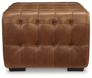  this ottoman is generously adaptable. Its combination of skillfully matched leather and faux leather upholstery exudes luxury and elegance. The cushion-'s dramatic tufting beckons you to kick back and relax.