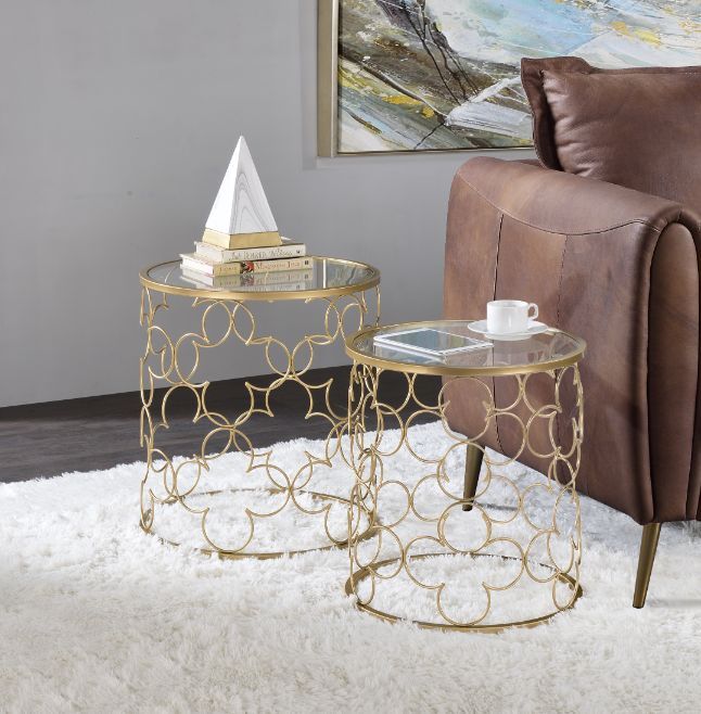 â€¢Tempered Glass Table Topâ€¢Drum Frame Metal Baseâ€¢5 mm Tempered Glass<br/><br/><b>Product Features</b><ul><li>Case: 2Pc/1Ctn</li><li>Finish: Clear Glass & Gold Finish</li><li>Style: Contemporary</li><li>Materials: Metal, Glass</li></ul><br/>