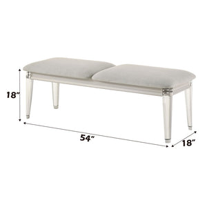  where light gray boucle meets a pearl white finish for an exquisite blend of sophistication and serenity. The clean lines and contemporary design create a harmonious balance
