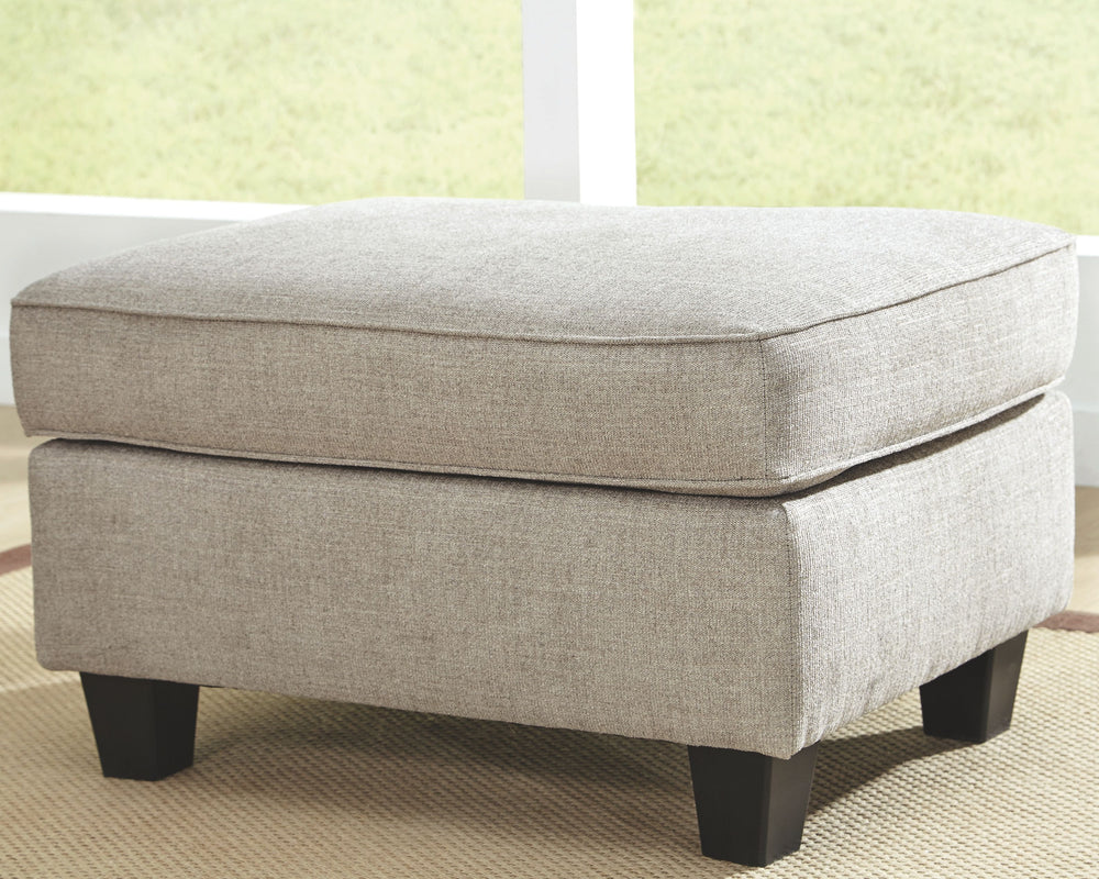 Raising understatement into an art form, this ottoman impresses with a tailored silhouette. Designed in a warm neutral color perfect in any contemporary home. One look at this sumptuous ottoman, youâ€™ll know youâ€™ve just stepped up your style. A treat f