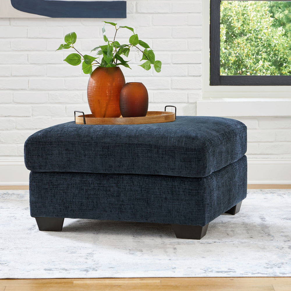 Looking to make a bold statement with color? Liven up your living room with this oversized ottoman. Its trend-right navy blue upholstery adds a playful pop of color to your decor. Pairing posh style with everyday comfort, this piece is a welcome addition 