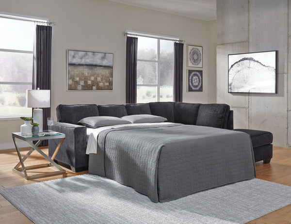  then this sleeper sectional is the answer. Sporting clean lines and sleek track arms