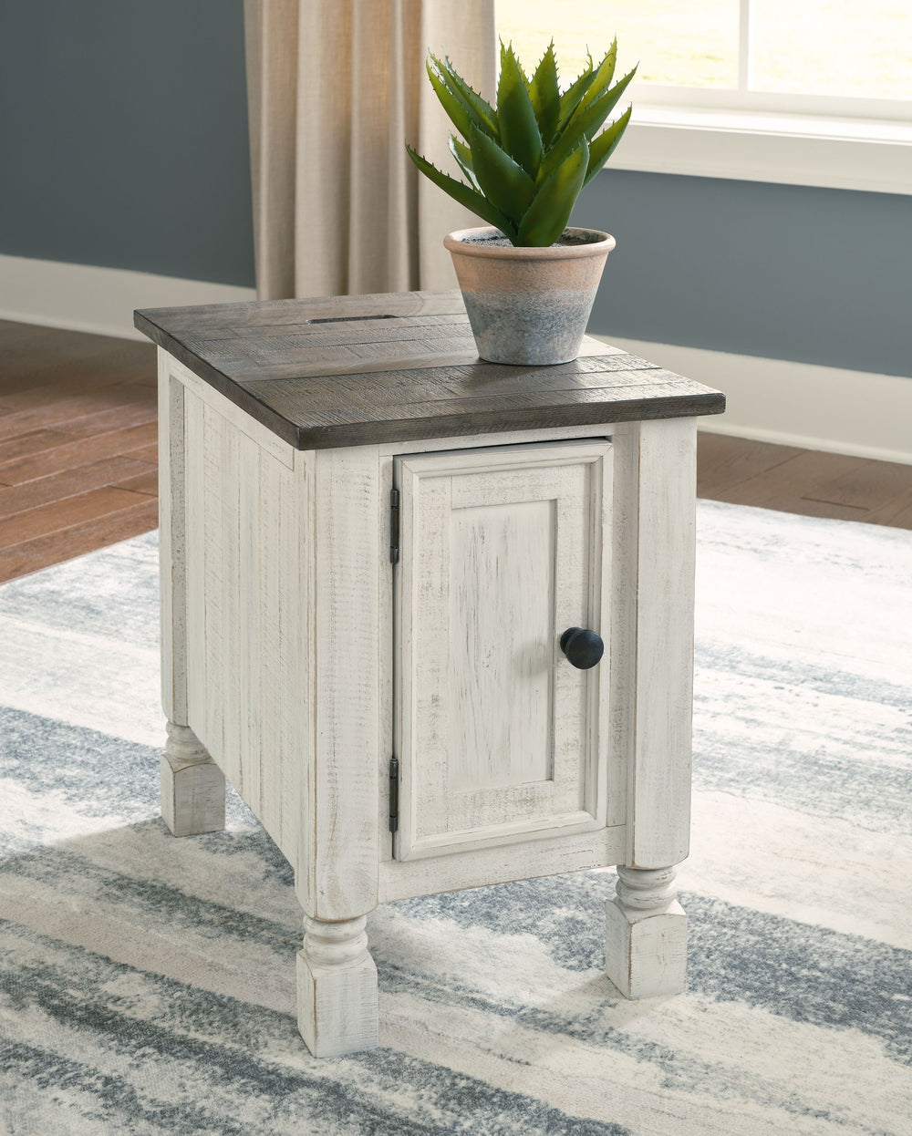 What a fresh interpretation of country classic style. Inspired by American farmhouse craftsmanship, but with an elevated sensibility, this chairside end table blends distinctive details such as turned post accents and raised door fronts for a substantial 