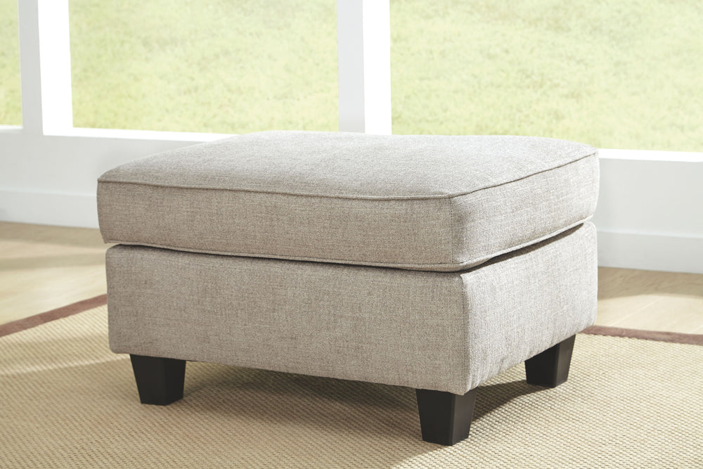For a fresh spot in your space, turn to this designer chair and ottoman. Wind down at the end of a long day when you sink into this canyon of comfort. <h4><b>Abney - Driftwood - Sofa Chaise</b></h4> <table width=-"100%-"><colgroup><col style=-"width: 30%