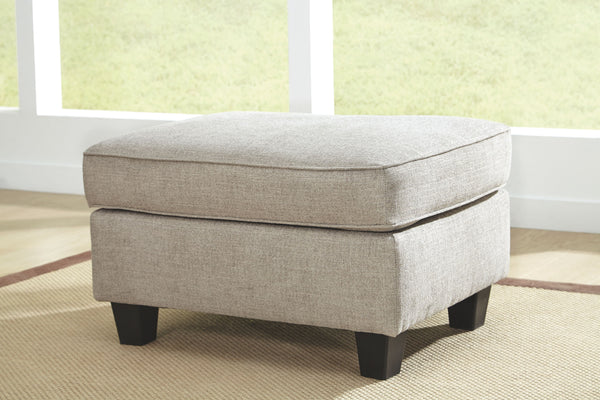 turn to this designer chair and ottoman. Wind down at the end of a long day when you sink into this canyon of comfort. <h4><b>Abney - Driftwood - Sofa Chaise</b></h4> <table width=-"100%-"><colgroup><col style=-"width: 30%