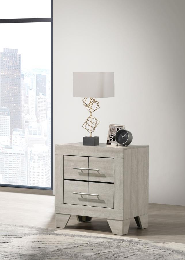 This contemporary two-drawer nightstand brings a chic blend of rustic and modern design to your bedside. Crafted with a rustic cream finish over rough-sawn, white-washed engineered paper veneer, it exudes a warm, textured appeal. Extra-wide polished nicke