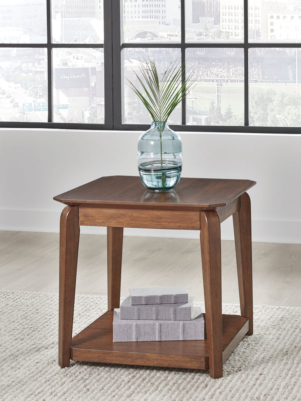  its softly rounded top and tapered legs offer a mid-century appeal well-suited to styles from modern to eclectic. And with a lower shelf for dis