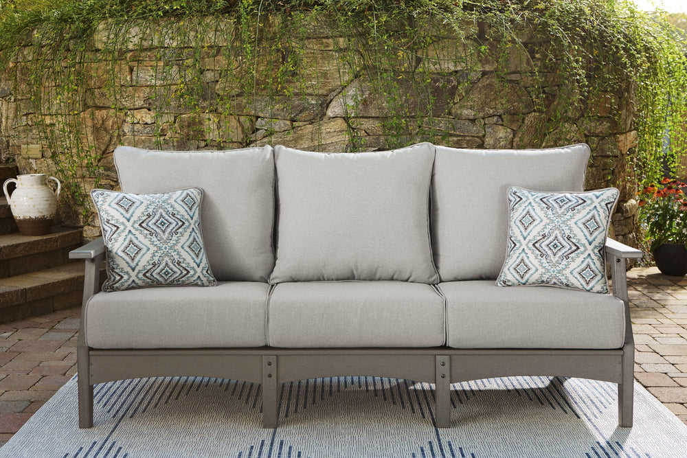 Itâ€™s the dawn of a new day for gray. Embrace the style trend with this outdoor sofa. Crafted of HDPE material that combines the exceptional durability and weather resistance you need with the â€œwood lookâ€ you love, this comfortably cushioned sofa tak
