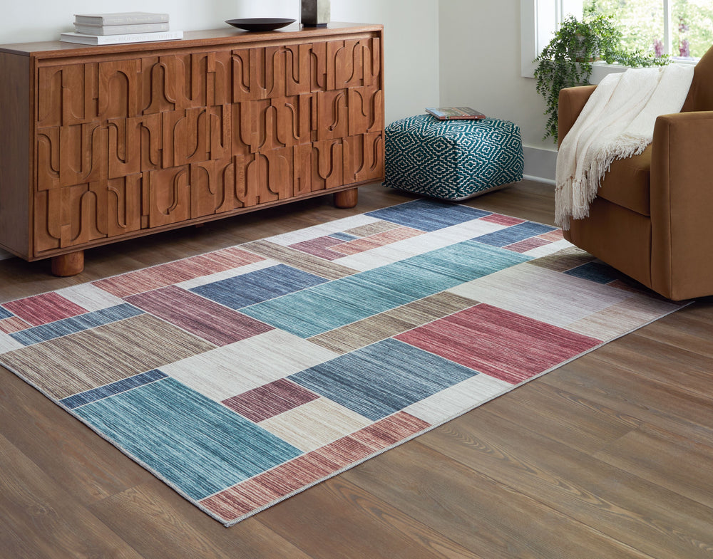 Invigorate a space with color and contemporary flair. Offering a brilliant spin on the chic lattice pattern, this area rug is sure to please with its vibrant palette and geometric design. And it-'s machine washable, so it-'s prepared for all the feet, paw