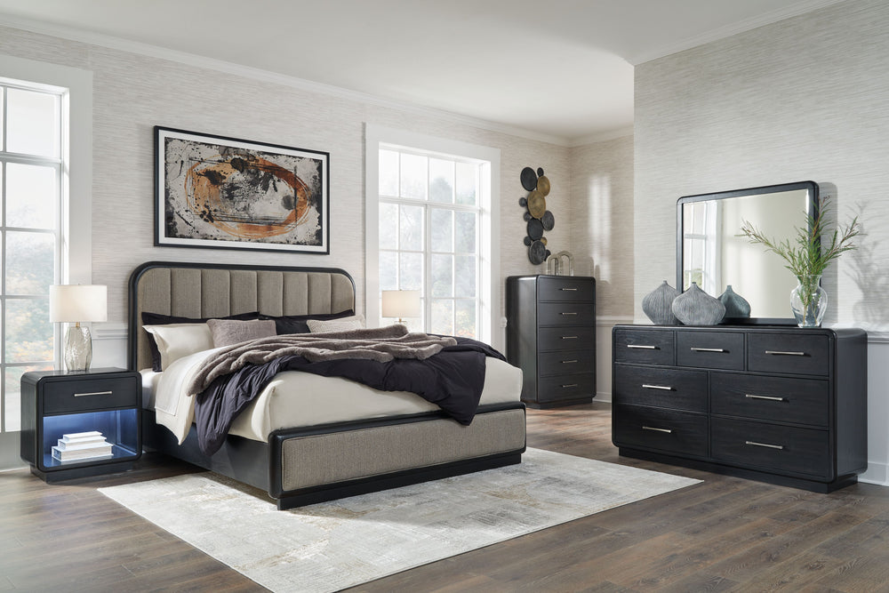 Rowanbeck - 7 Pc. - Dresser, Mirror, Chest, California King Upholstered Panel Bed, 2 Nightstands - Gray / Black