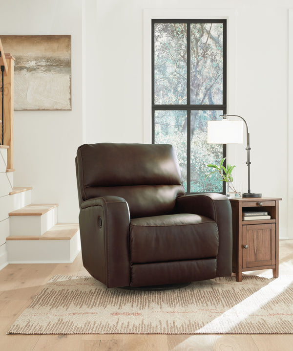  swivel and gentle rocking motions relax you in refined style. And the expertly matched leather and faux leather upholstery