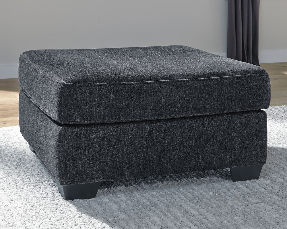  then this oversized accent ottoman is the answer. Its clean-lined profile is beautifully contemporary. Plush chenille fabric and plump cushioning make it so easy to comfortably kick up your heels. And the ottoman-'s richly neutra