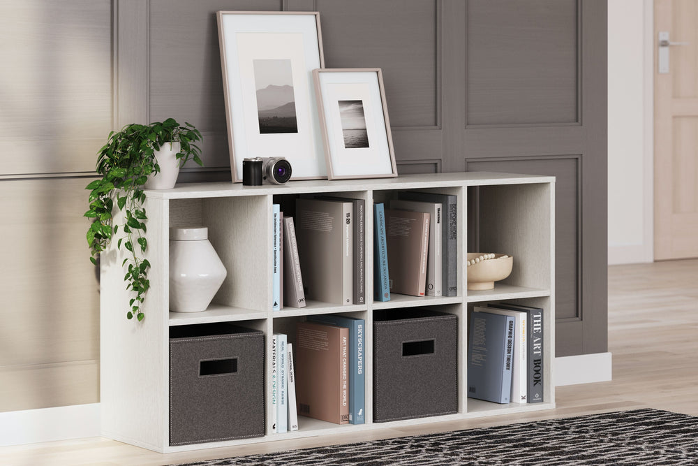 Dare to take minimalism to the max. This eight-cube organizer has an air of sleek simplicity thanks to its white painted finish with subtle replicated wood grain. And with the ability to keep your space clutter-free with its storage cubbies, there-'s no d