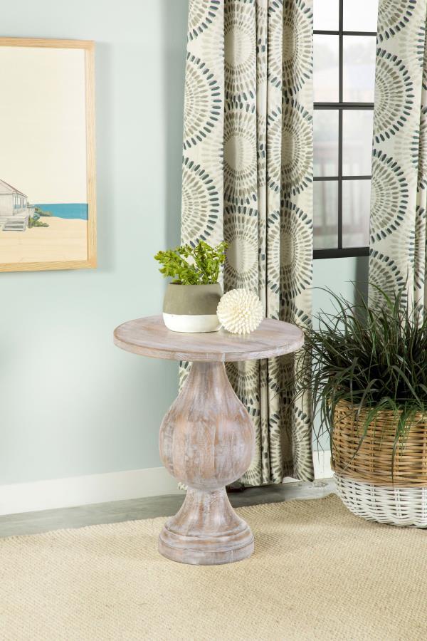  this modern side table offers a stylish blend of art and sophistication. A pedestal design doubles down on elegance and creates an eye-catching look. Infuse romantic charm to a living space or entryway with a table featu