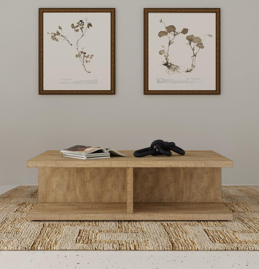 Enhance your living room with this mango-finished coffee table, blending rustic charm with modern functionality. Crafted from engineered wood and coated in a scratch-resistant laminate veneer, it ensures durability and effortless maintenance. The open, di