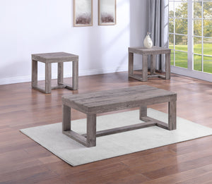 Infuse your living room with a touch of rustic elegance with this distinctive cocktail table set. Crafted with a weathered wood finish, the robust, clean-lined design exudes simplicity and strength, creating a harmonious blend of rustic charm and contempo