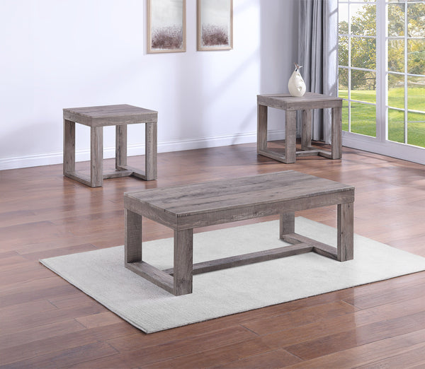 Infuse your living room with a touch of rustic elegance with this distinctive cocktail table set. Crafted with a weathered wood finish, the robust, clean-lined design exudes simplicity and strength, creating a harmonious blend of rustic charm and contempo