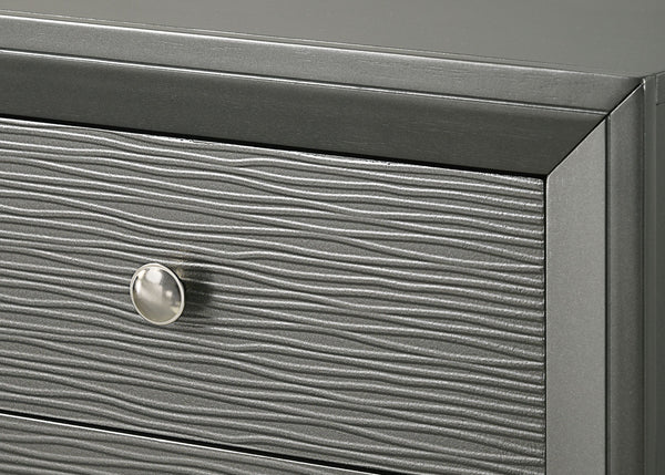  characterized by its rich gunmetal finish and distinctive textured front panels. The centerpiece