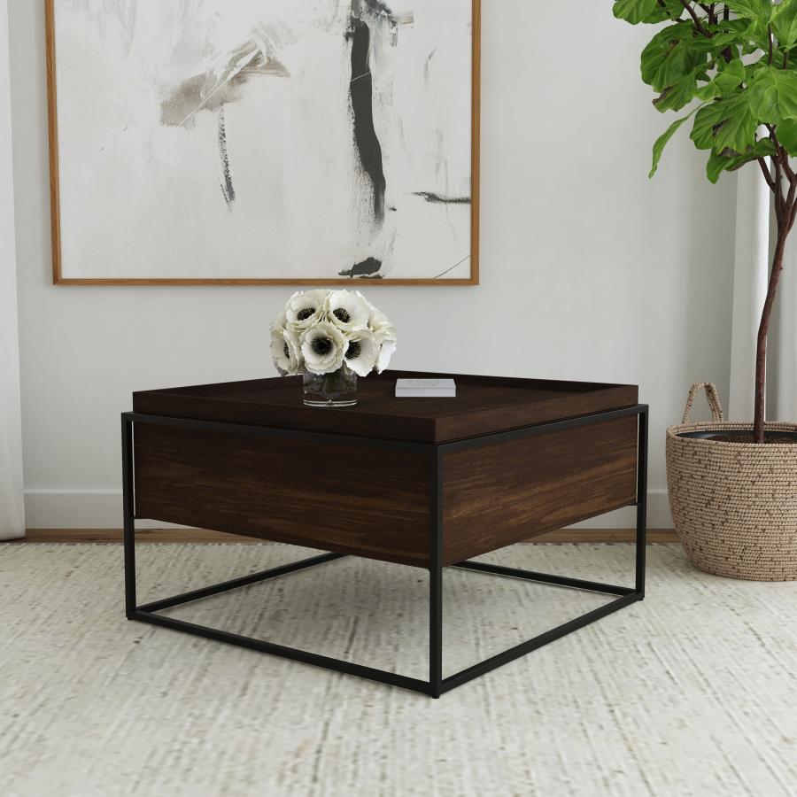 This cocktail coffee table showcases a seamless blend of solid mango wood and an iron frame, creating a balance of industrial style and rustic warmth. The expansive tray-top surface provides ample space for decorative pieces, books, or beverages, while a 