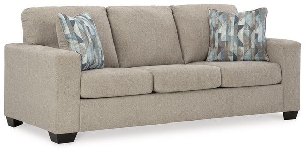  and the wide track arms are eager to support your quest for total relaxation. Distressed abstract toss pillows bring a fresh breath of contemporary styl