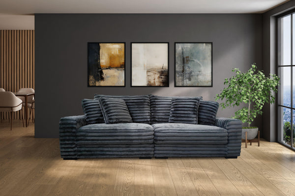  enhancing any living space. Upholstered in 100% charcoal gray polyester fabric with a fluffy