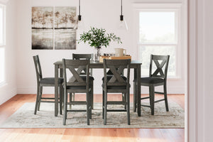  this counter height dining set is crafted with fascinating flair. A subtle gray wash finish gives the clean-lined design a casually cool sensibility. Plushly cushioned seats in a soft