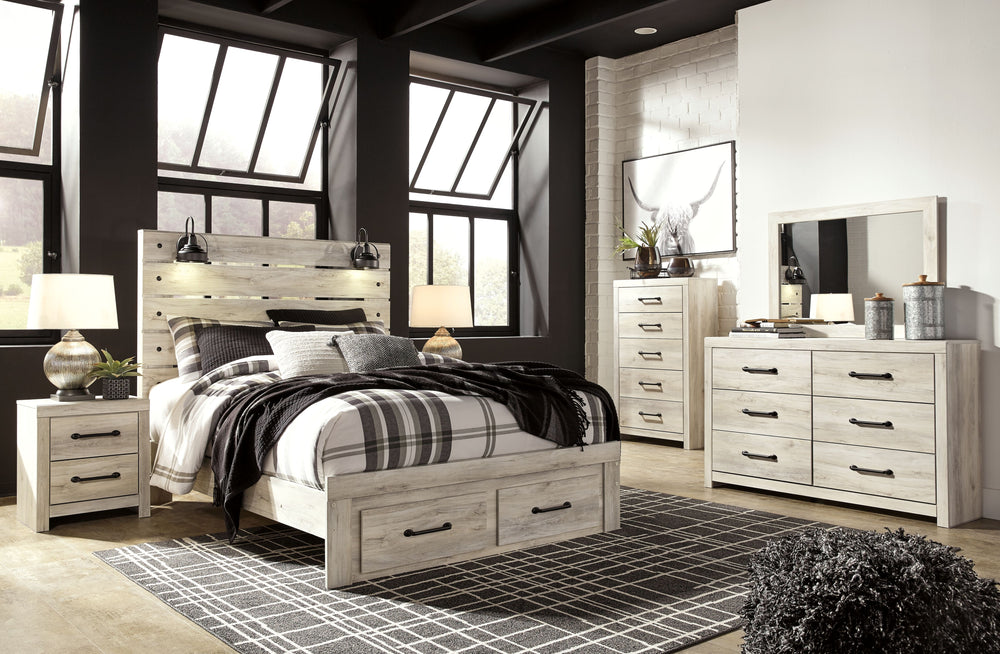 Wispy white finish over replicated Oak grain with authentic touch. Large scaled dark colored handles. Cases feature a framed front and pilasters. All panel headboards (53,57,58,87) feature decorative matte black sconce lights. Side roller glides for smoot