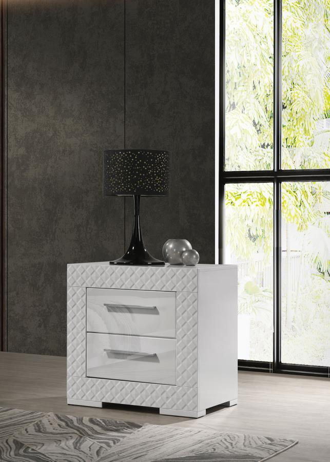 Add a touch of sophistication to your bedroom with this elegant nightstand. Featuring a high gloss finish, it reflects a modern Italian style with a clean, minimalist design. The nightstand includes two spacious drawers, perfect for keeping your bedside e