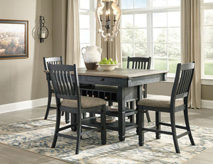 Unique two-tone finish with a combination of Oak and Acacia substrates combining a trendy textured antique black color with table and server tops finished in a textural weathered oak finish. Rectangular dining table features six convenient drawers for sto