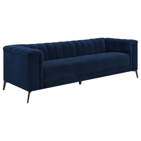 This magnificent transitional sofa will bring a dynamic radiance to your living space. It-'s upholstered in a stunning navy blue matte velvet fabric that you have to see to believe. Whether you sit or lie down, you-'ll love the bench-style seat with pocke