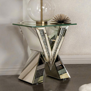  artistic flair to any living space. Its striking V-shaped base features mirrored panels and glittering crystal accents