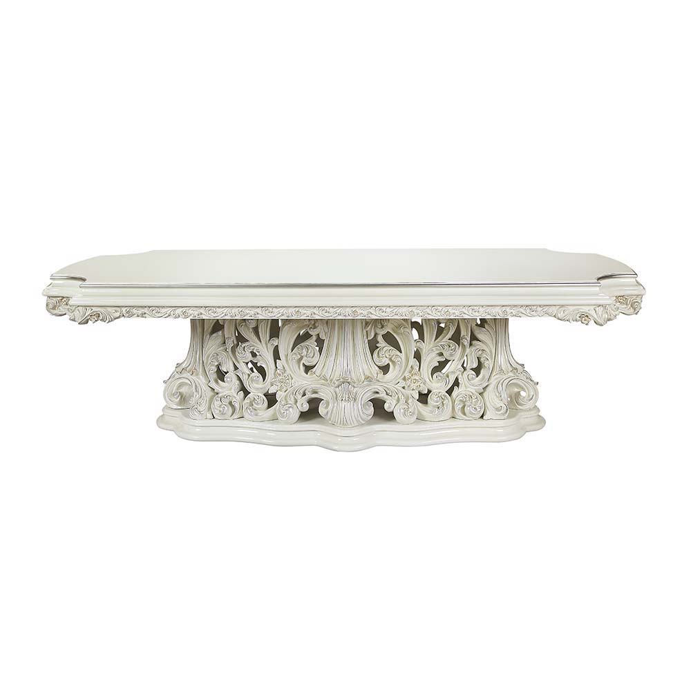 Exuding elegance and refinement, the Adara dining table is designed after the elaborate Rococo style. The single pedestal base is elaborate and commands the attention of everyone. Leave guests stunned with its beauty. Floral and leaf motives make up the c
