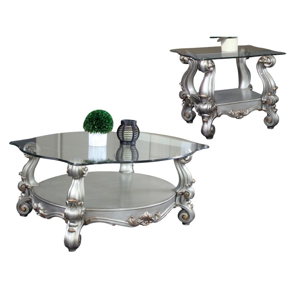 KD, Coffee Table w/Curved Glass Top â€¢ Open Compartment: Bottom Shelf â€¢ 12mm Clear Tempered Glass w/Beveled â€¢ Oversized Scrolled Legs & Shelf Apron: Poly Resin with Antique Contrast Finish<br/><br/><b>Product Features</b><ul><li>Exclusive Design</li>