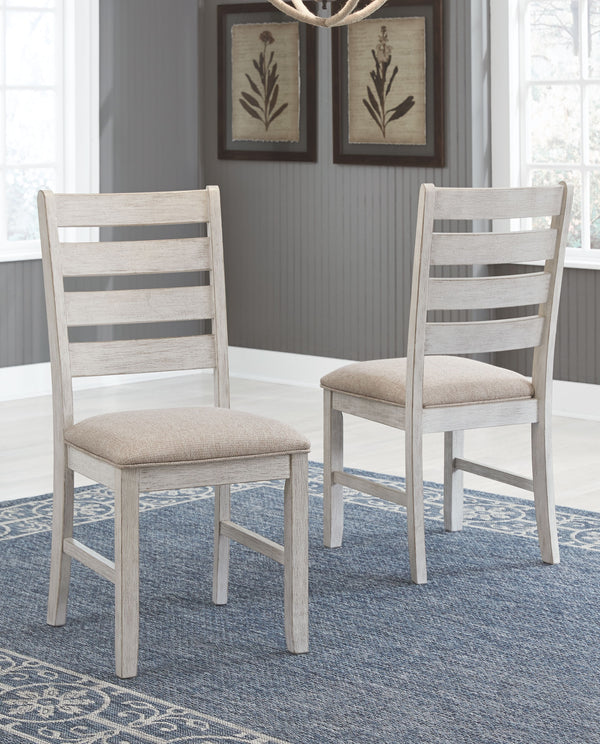  this comfortably cushioned chair sports a grayish white finish with rub through effect for timeworn appeal.<br><br><b>