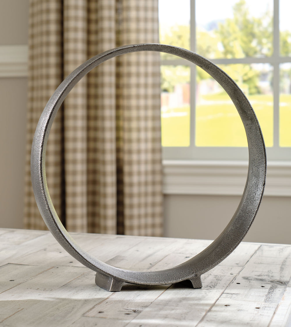 A modern take on classic geometric design, this sculpture rounds out your decor in sleek style. The antiqued pewter-tone finish has a chic appeal that remains versatile, suiting spaces from contemporary to casual.<br/><br/><b>Product Features</b><ul><li>S