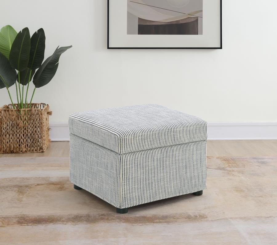 This versatile storage ottoman enriches your living space with stylish functionality. Upholstered in soft, neutral fabric, its hydraulic lift top reveals hidden storage perfect for stashing blankets, magazines, or personal essentials. Use as a footrest, e