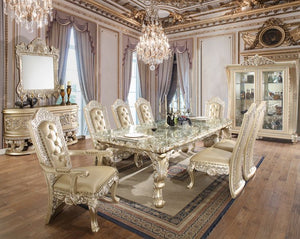Vatican - Dining Table - Beige - 99-"<br/><br/><b>Product Features</b><ul><li>Fixed Table Top</li><li>Leg Table</li><li>Sculpture Floral & Upholstery Chair</li><li>Button Tufted</li><li>Curio w/4 Tier Shelf</li><li>Case: 1Set/4Ctn</li><li>Finish: Champagn